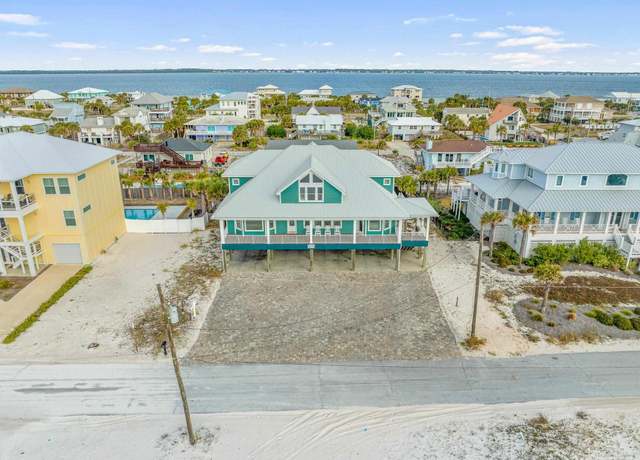 Property at 1311 Ariola Dr, Pensacola Beach, FL 32561, 7 beds, 8.5 baths