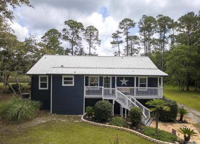 Property at 8840 Sand Pine Dr, Navarre, FL 32566, 3 beds, 2 baths