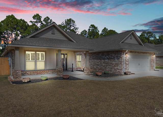 Property at 7128 Flintwood St, Navarre, FL 32566, 4 beds, 3 baths