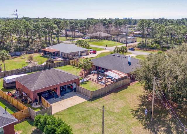 Property at 7770 Fenwick St, Navarre, FL 32566, 4 beds, 3 baths