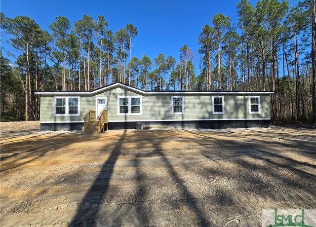Property at 5930 Cox Rd SW, Townsend, GA 31331, 4 beds, 3 baths