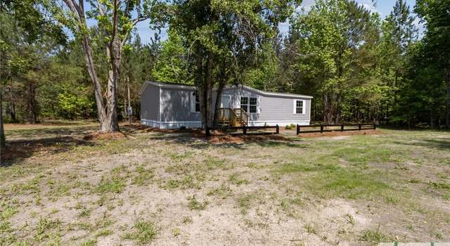 Photo of 810 Simpsontown Rd, Newington, GA 30446