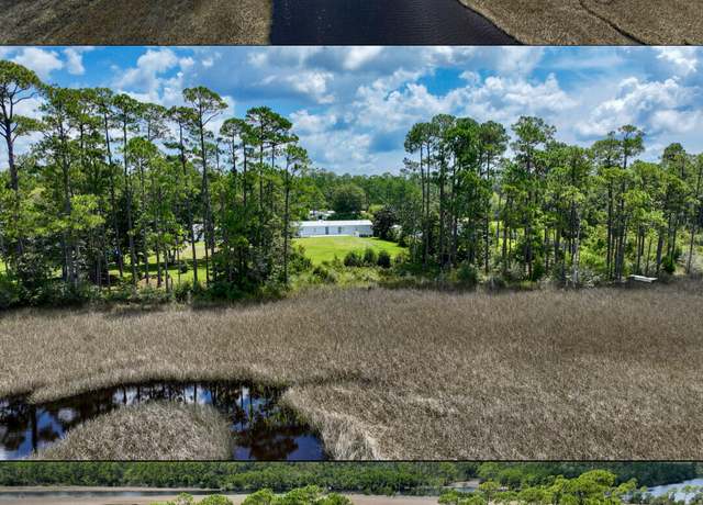 Property at 9121 S Burnt Mill Creek Rd, Southport, FL 32409, 4 beds, 2.5 baths