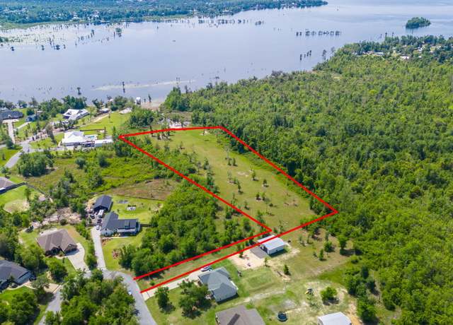 Property at 4502 Tender Creek Cv, Southport, FL 32409