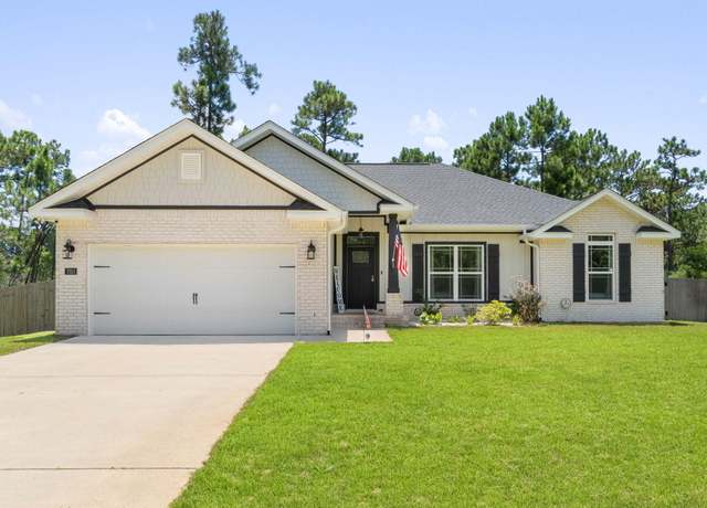 Property at 7053 Leisure St, Navarre, FL 32566, 4 beds, 2 baths