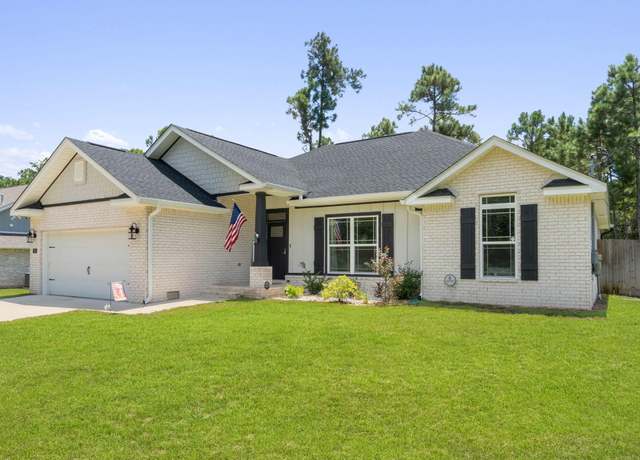 Property at 7053 Leisure St, Navarre, FL 32566, 4 beds, 2 baths