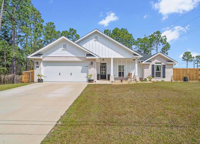 Property at 6582 Flintwood St, Navarre, FL 32566, 4 beds, 2 baths