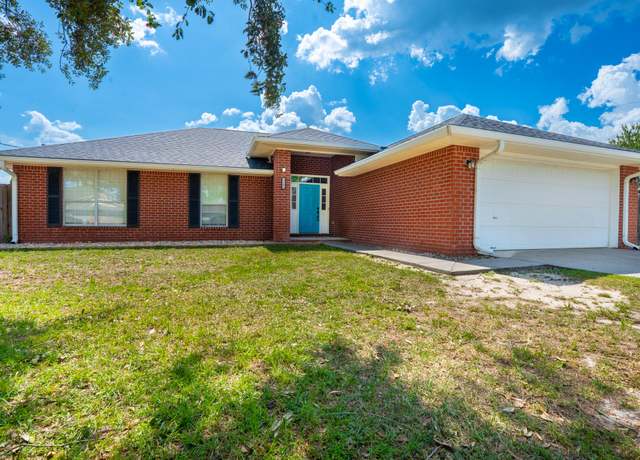 Property at 2107 Ortega St, Navarre, FL 32566, 4 beds, 2 baths