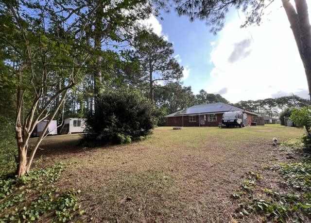 Property at 1957 Cardinal Ln, Navarre, FL 32566, 3 beds, 2 baths