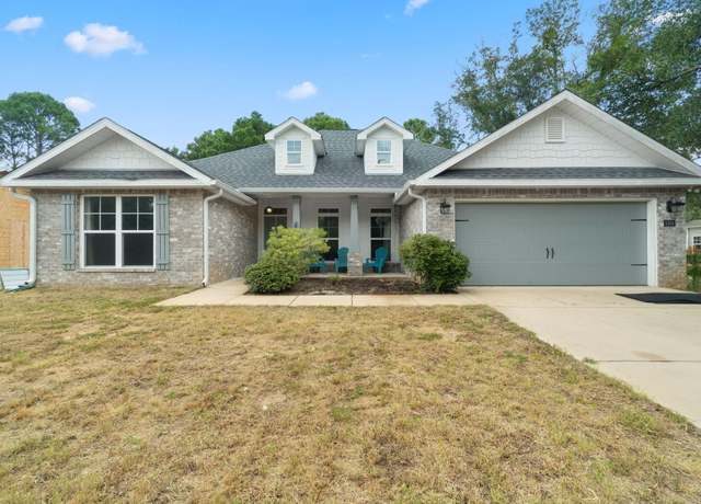 Property at 5208 Aqua Vista Dr, Gulf Breeze, FL 32563, 4 beds, 2 baths