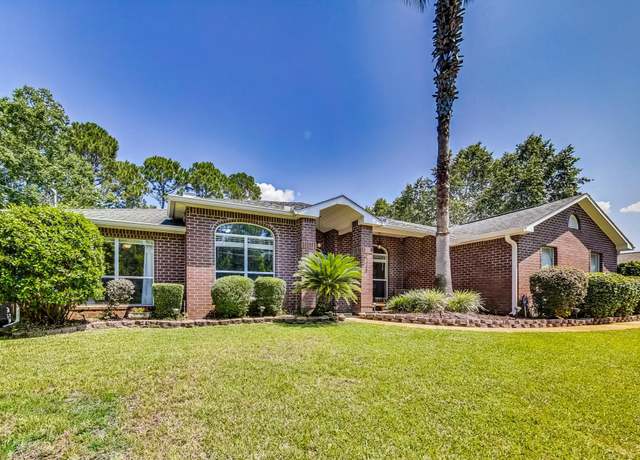 Property at 7040 Flintwood St, Navarre, FL 32566, 4 beds, 2 baths