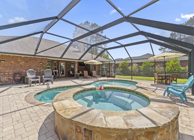 Property at 7120 Flintwood St, Navarre, FL 32566, 4 beds, 3 baths