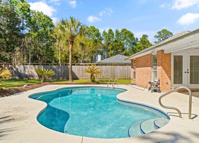 Property at 1048 Woodlore Cir, Gulf Breeze, FL 32563, 3 beds, 2 baths