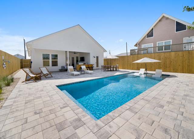 Property at 314 Tanaga St, Panama City Beach, FL 32413, 4 beds, 3.5 baths