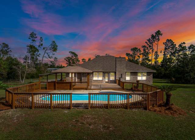 Property at 8113 S Mccann Rd, Southport, FL 32409, 3 beds, 2 baths