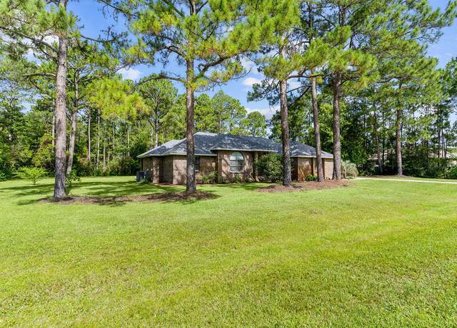 Property at 2167 Sunrise Dr, Navarre, FL 32566, 3 beds, 2 baths