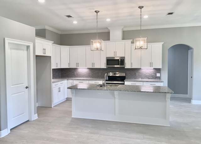 Property at 6590 Bluefish Rd, Navarre, FL 32566, 4 beds, 3 baths