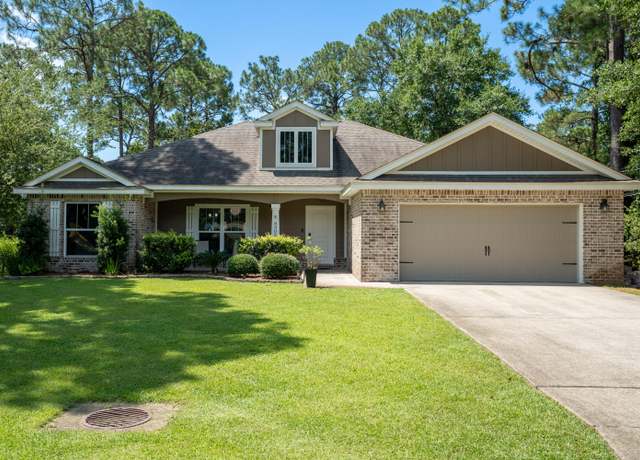 Property at 8303 Sevilla St, Navarre, FL 32566, 3 beds, 2 baths