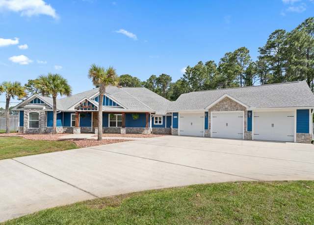 Property at 8302 Nevada St, Navarre, FL 32566, 4 beds, 2.5 baths