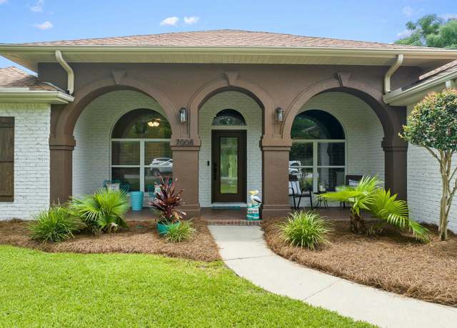 Property at 7008 Turnberry Cir, Navarre, FL 32566, 4 beds, 2 baths