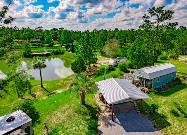 Property at 6291 Coy Burgess Loop, FL 32435, 4 beds, 2 baths