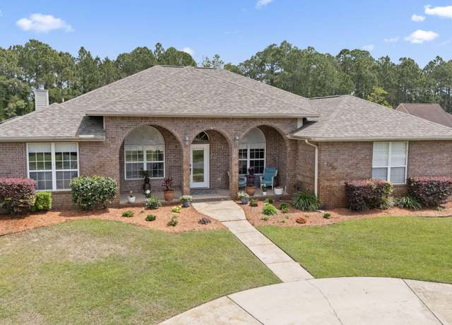 Property at 2500 Masters Blvd, Navarre, FL 32566, 4 beds, 2 baths