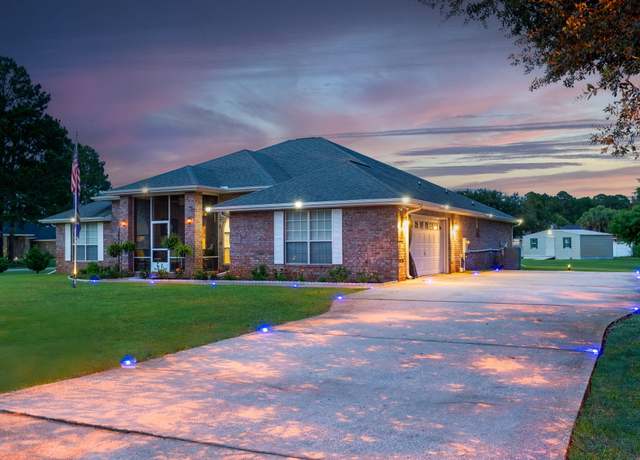 Property at 2424 Pineneedle Dr, Navarre, FL 32566, 4 beds, 3 baths
