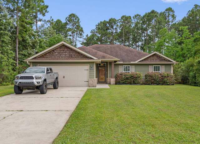 Property at 8247 Tavira St, Navarre, FL 32566, 4 beds, 2 baths