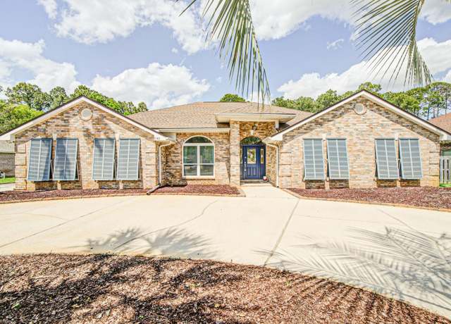Property at 7182 Siesta St, Navarre, FL 32566, 4 beds, 3 baths