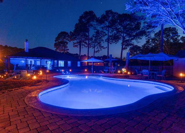 Property at 7044 Sawfish St, Navarre, FL 32566, 5 beds, 3 baths