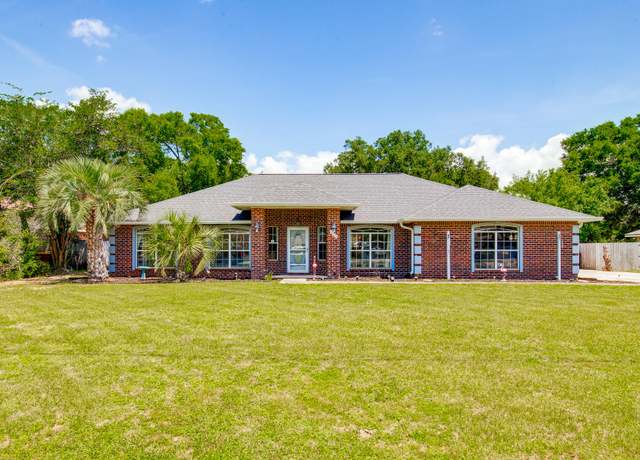 Property at 6612 Fairmont St, Navarre, FL 32566, 4 beds, 2 baths