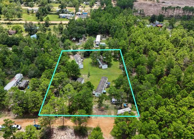 Property at 143 W Honeysuckle St, FL 32433, 12 beds, 4 baths