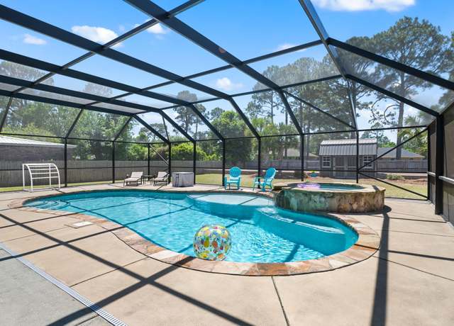Property at 2411 Tumbleweed Dr, Navarre, FL 32566, 4 beds, 2.5 baths
