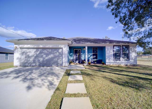 Property at 7580 East Bay Blvd, Navarre, FL 32566, 4 beds, 2 baths