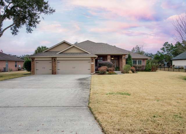Property at 7030 Pro Am Ct, Navarre, FL 32566, 4 beds, 3 baths