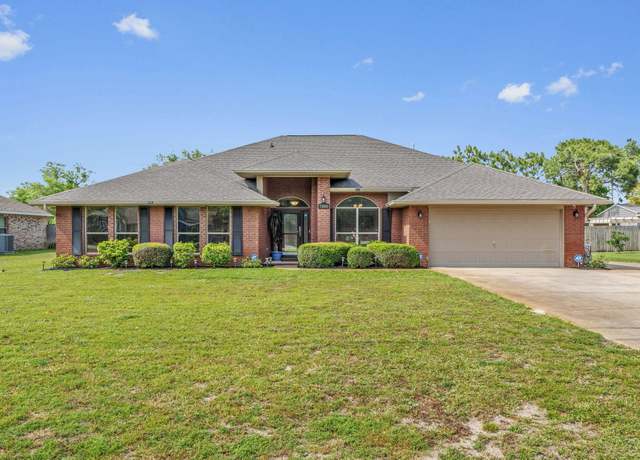 Property at 7302 Manatee St, Navarre, FL 32566, 4 beds, 3 baths