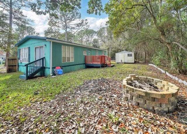Property at 9028 Larker Woods Dr, Navarre, FL 32566, 3 beds, 2 baths