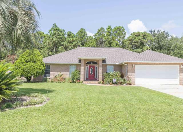 Property at 1427 Nautilus Dr, Navarre, FL 32566, 4 beds, 2 baths