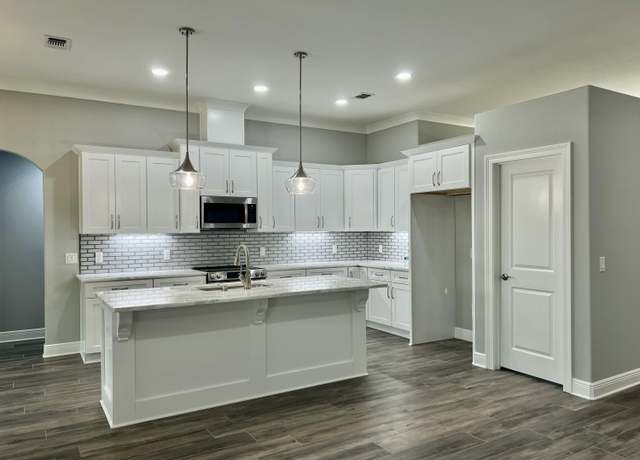 Property at 7118 Menton St, Navarre, FL 32566, 4 beds, 3 baths