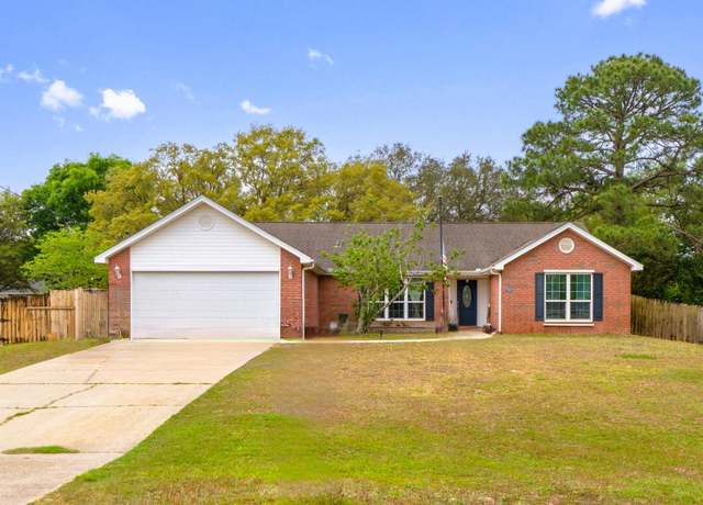 Property at 7199 Manatee St, Navarre, FL 32566, 4 beds, 2 baths