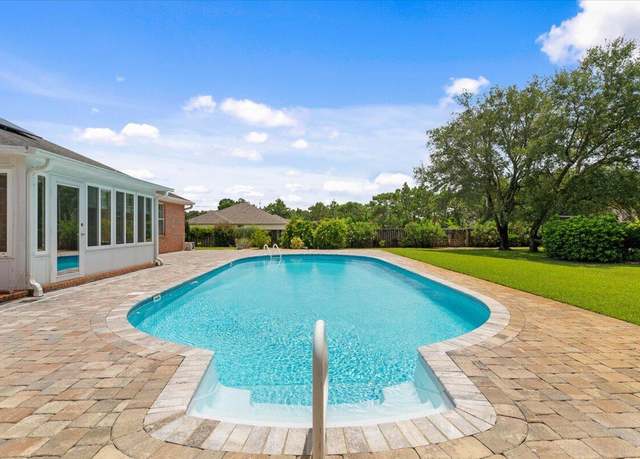 Property at 2025 Resort St, Navarre, FL 32566, 4 beds, 3 baths