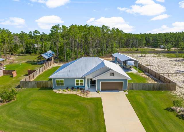 Property at 1825 White Western Lake Ln, Southport, FL 32409, 3 beds, 2.5 baths