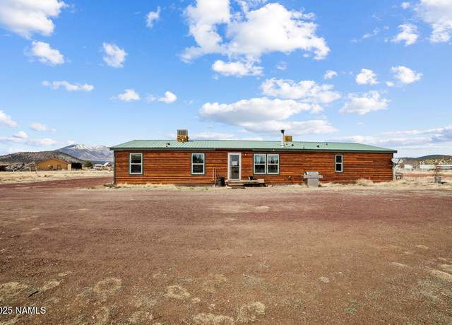 Property at 8595 E Mercury Dr, Flagstaff, AZ 86004, 4 beds, 3 baths