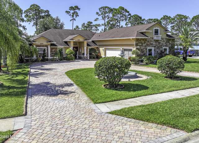 Property at 1866 Amberwood Dr SE, Palm Bay, FL 32909, 5 beds, 4 baths