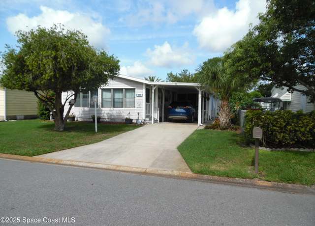 Property at 715 Gladiolus Dr E, Barefoot Bay, FL 32976, 2 beds, 2 baths