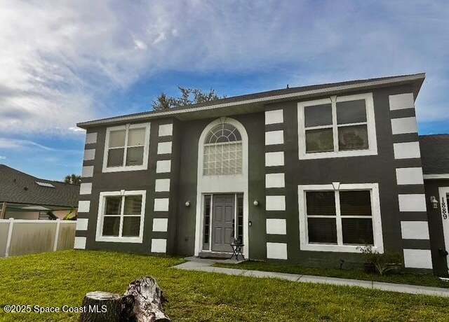 Property at 1889 Nanton St NW, Palm Bay, FL 32907, 4 beds, 2.5 baths