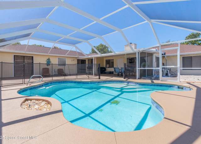Property at 1814 Oak Dr N, Rockledge, FL 32955, 5 beds, 3 baths