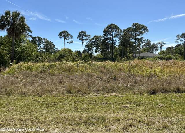 Property at 1556 Trojan St SE, Palm Bay, FL 32909