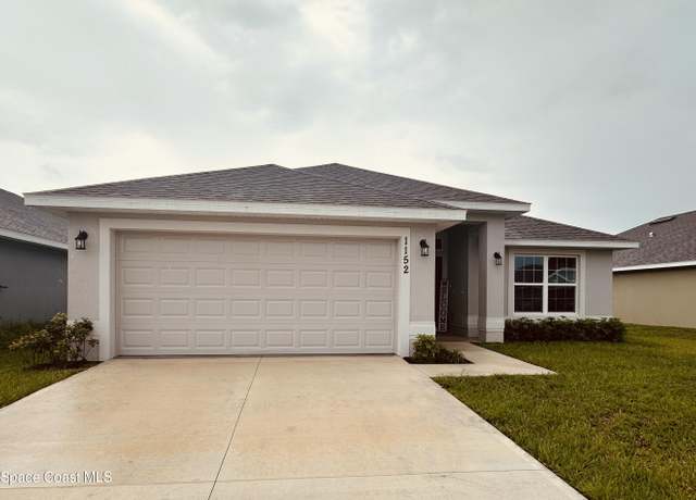 Property at 1152 Tupelo Cir, Cocoa, FL 32926, 4 beds, 2 baths