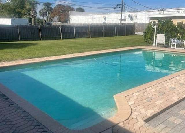 Property at 2571 NE Vernon Dr NE, Palm Bay, FL 32905, 4 beds, 3 baths